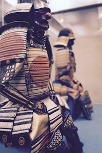 japanese samurai costumes in a museum