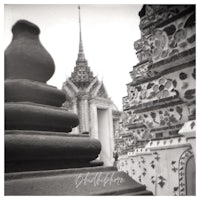 a black and white photo of a temple in thailand