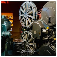 a movie projector on display in a museum