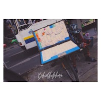 a bicycle cart with a map on it