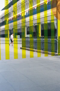 a man is riding a skateboard in front of a building
