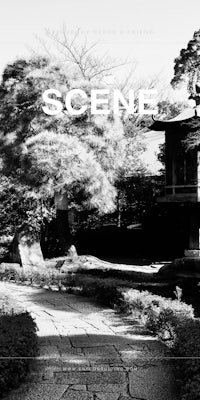 a black and white photo of a japanese garden