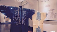japanese kimonos on display in a museum