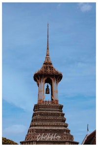 the bell tower of a temple in thailand